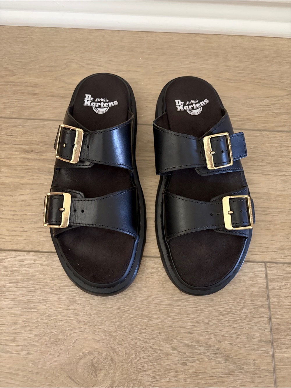 Dr. Martens Black Leather Double-Buckle Slide Sandals with Gold Buckles Josef